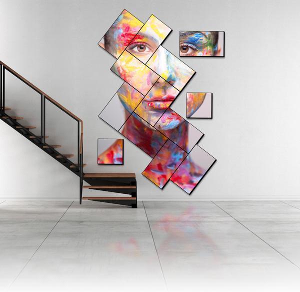 درج حديث وجدار فيديو فسيفسائي فني يعرض قطعة فنية من وجه مطلي