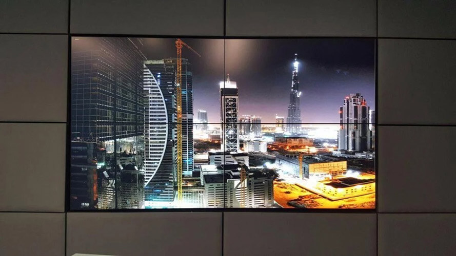 4 panel video wall displaying a photo of downtown Dubai at night